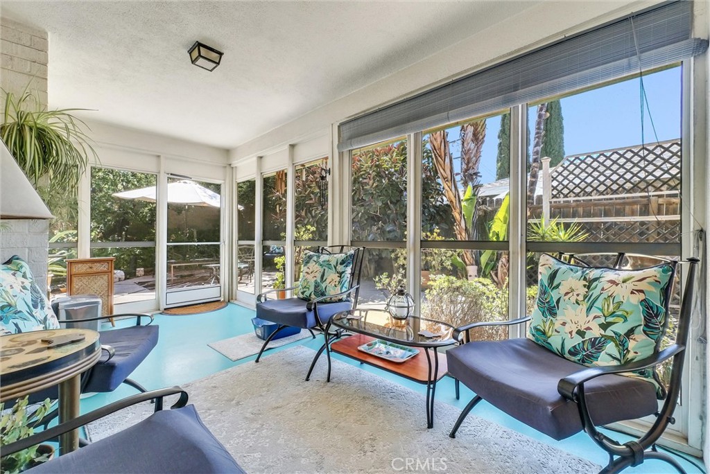 256 East Monterey Road Corona, CA 92879 - Photo 25 of 32 a living room with furniture and a window