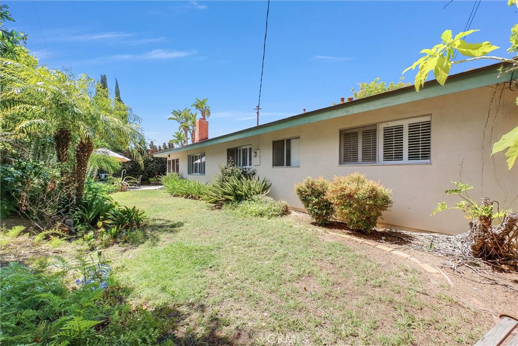 256 East Monterey Road Corona, CA 92879 - Photo 29 of 32 a front view of a house with a yard