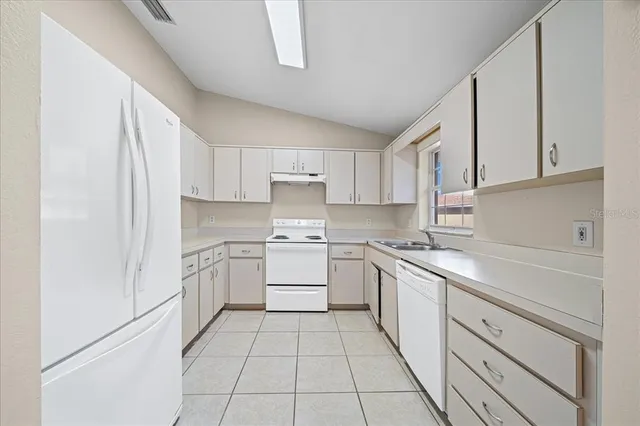 a view of a house with a garden