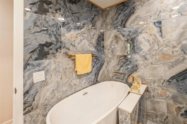 view of a bathroom with a sink and a mirror