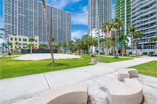 a view of a building with a yard