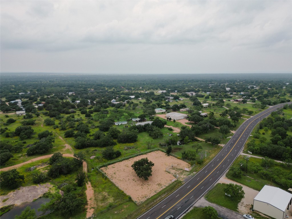 0 West Ranch Road Buchanan Dam, TX 78609 - Photo 3 of 21 an aerial view of a residential houses with outdoor space and trees