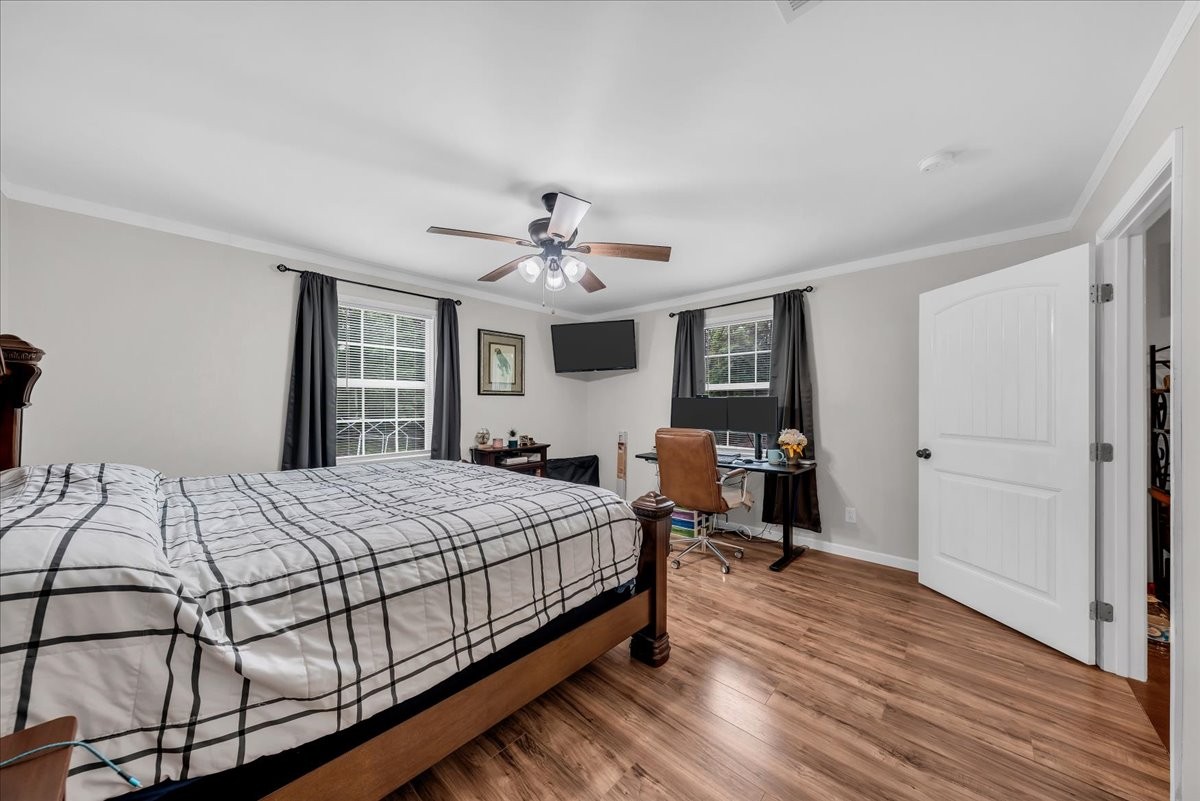 802 Meyers Road Altamont, TN 37301 - Photo 7 of 30 a bedroom with a bed and wooden floor
