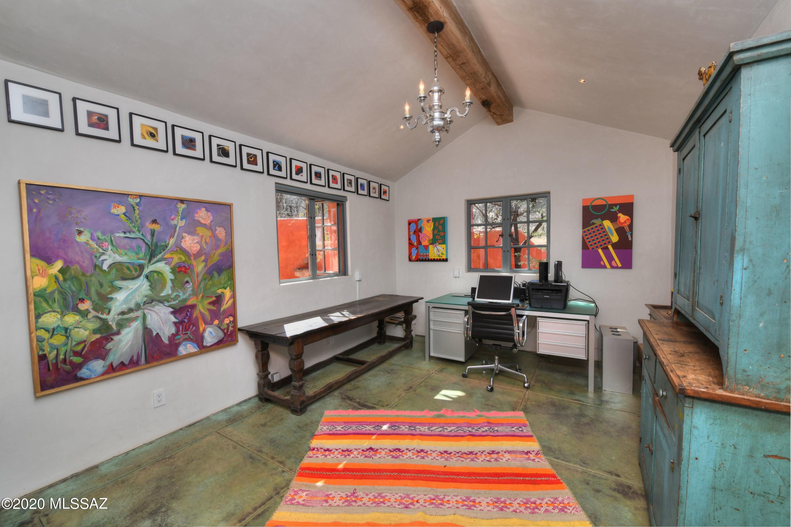 360 Harshaw Creek Road Patagonia, AZ 85624 - Photo 31 of 50 a living room with furniture and a rug