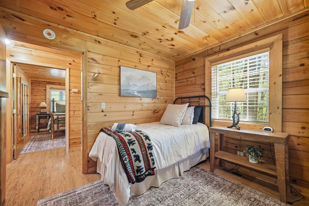 25 Foster Lane Morganton, GA 30560 - Photo 20 of 28 a bed room with a bed and a tv