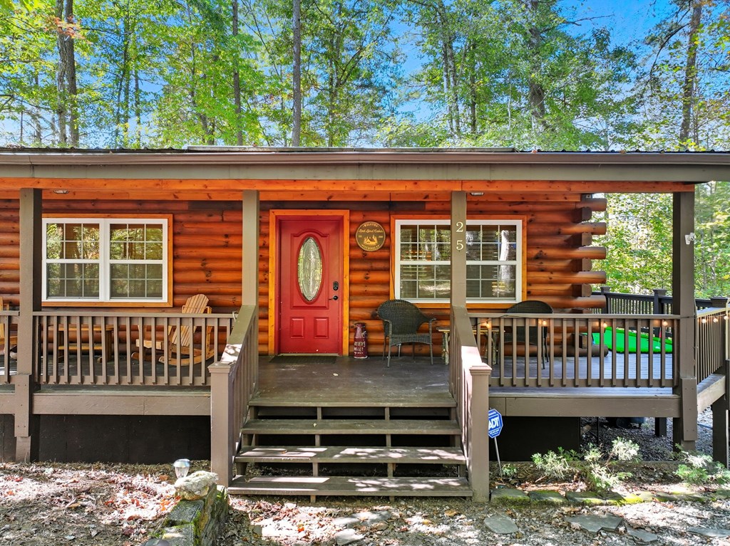 25 Foster Lane Morganton, GA 30560 - Photo 4 of 28 a front view of a house with a balcony
