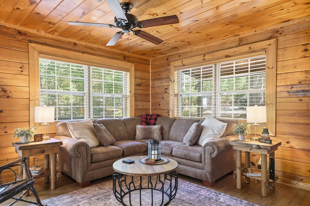25 Foster Lane Morganton, GA 30560 - Photo 10 of 28 a living room with furniture and a large window