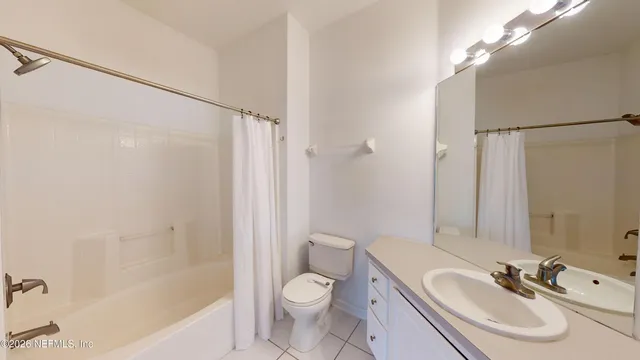 a view of storage and utility room with racks on the wall