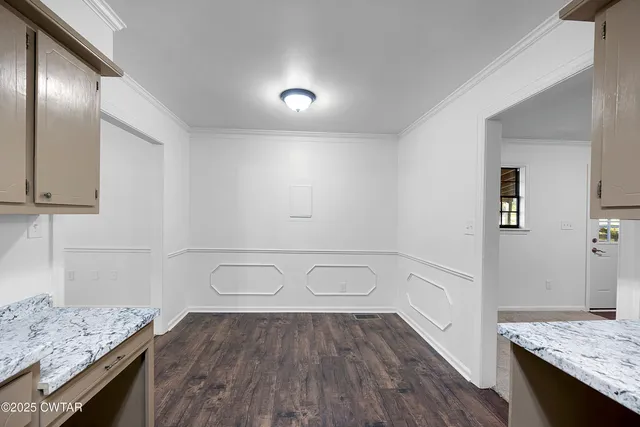 a view of a storage and utility room