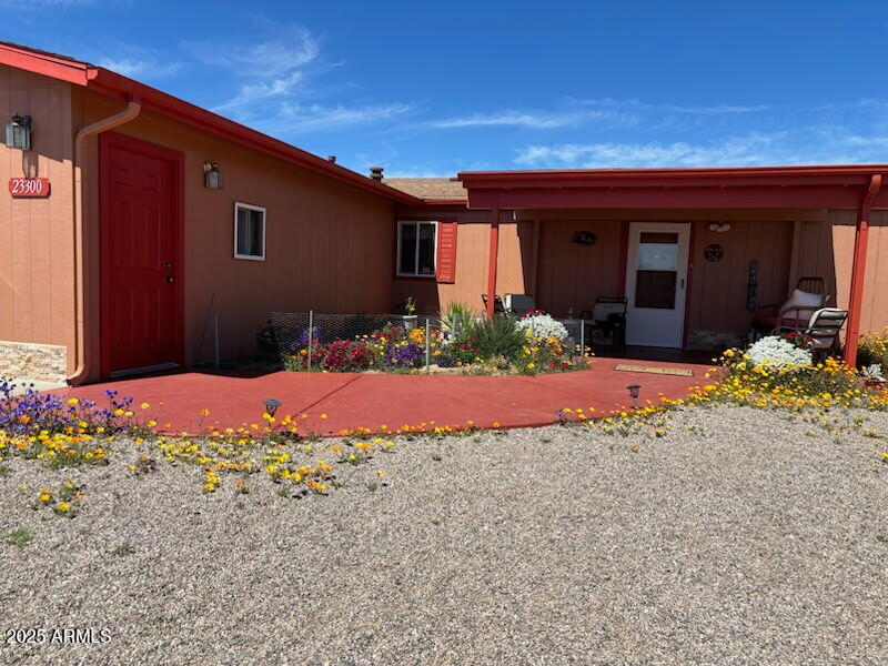 23300 West Mule Deer Lane, Unit 2 Congress, AZ 85332 - Photo 1 of 17 a front view of a house with a yard