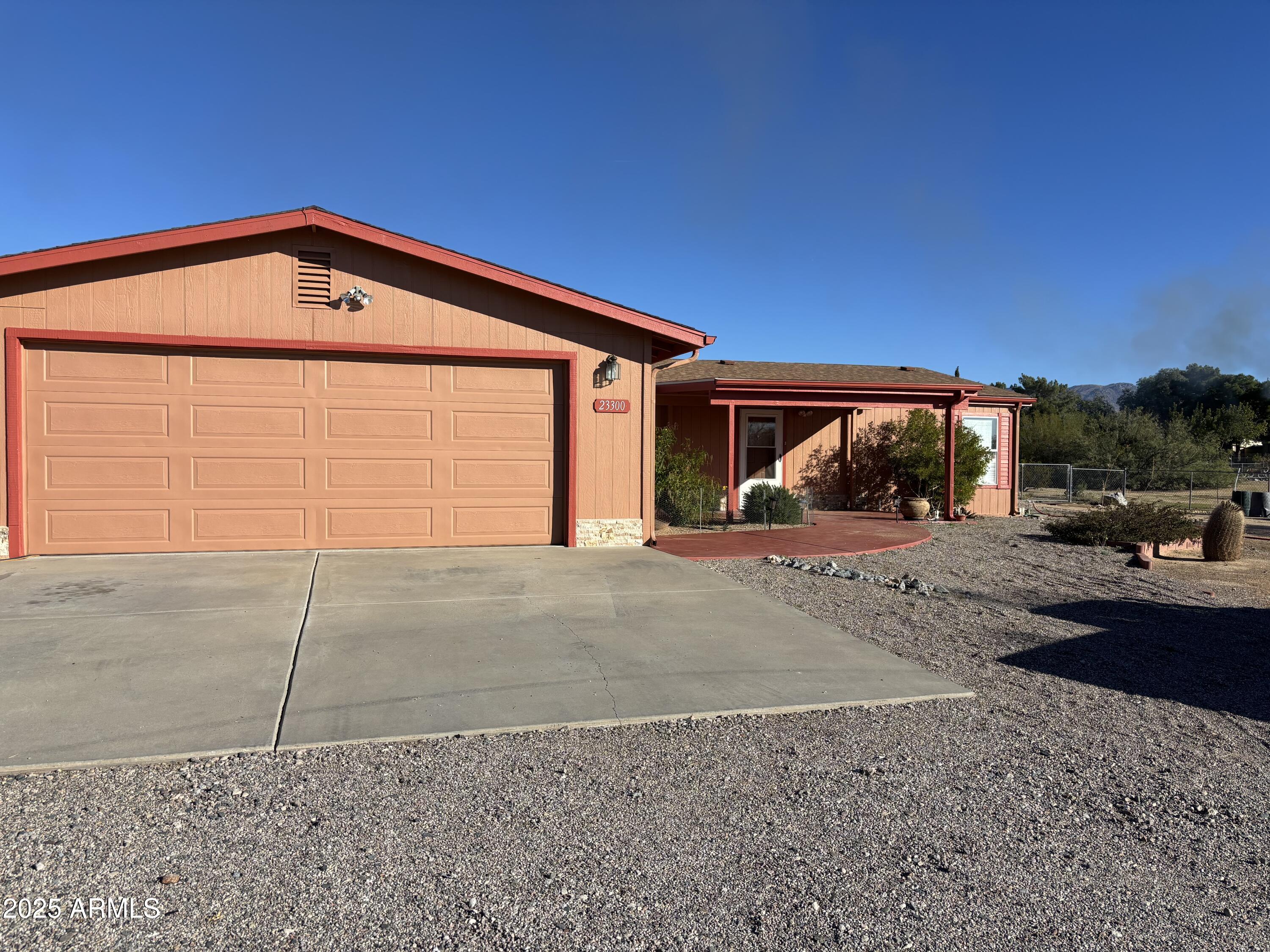 23300 West Mule Deer Lane, Unit 2 Congress, AZ 85332 - Photo 17 of 17 a view of entrance gate of a house