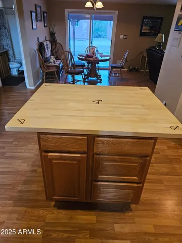 a room with furniture and wooden floor