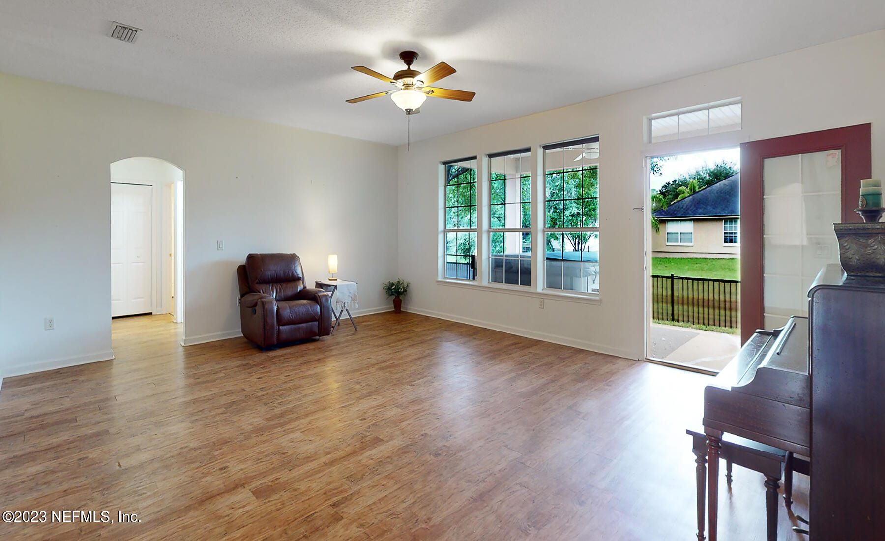132 Summerhill Circle St. Augustine, FL 32086 - Photo 13 of 35 a view of livingroom with furniture hardwood floor and workspace
