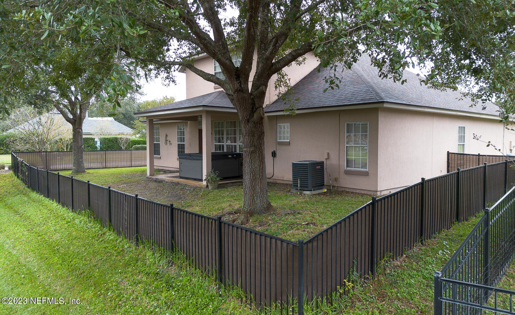 132 Summerhill Circle St. Augustine, FL 32086 - Photo 15 of 35 a view of a house with wooden fence