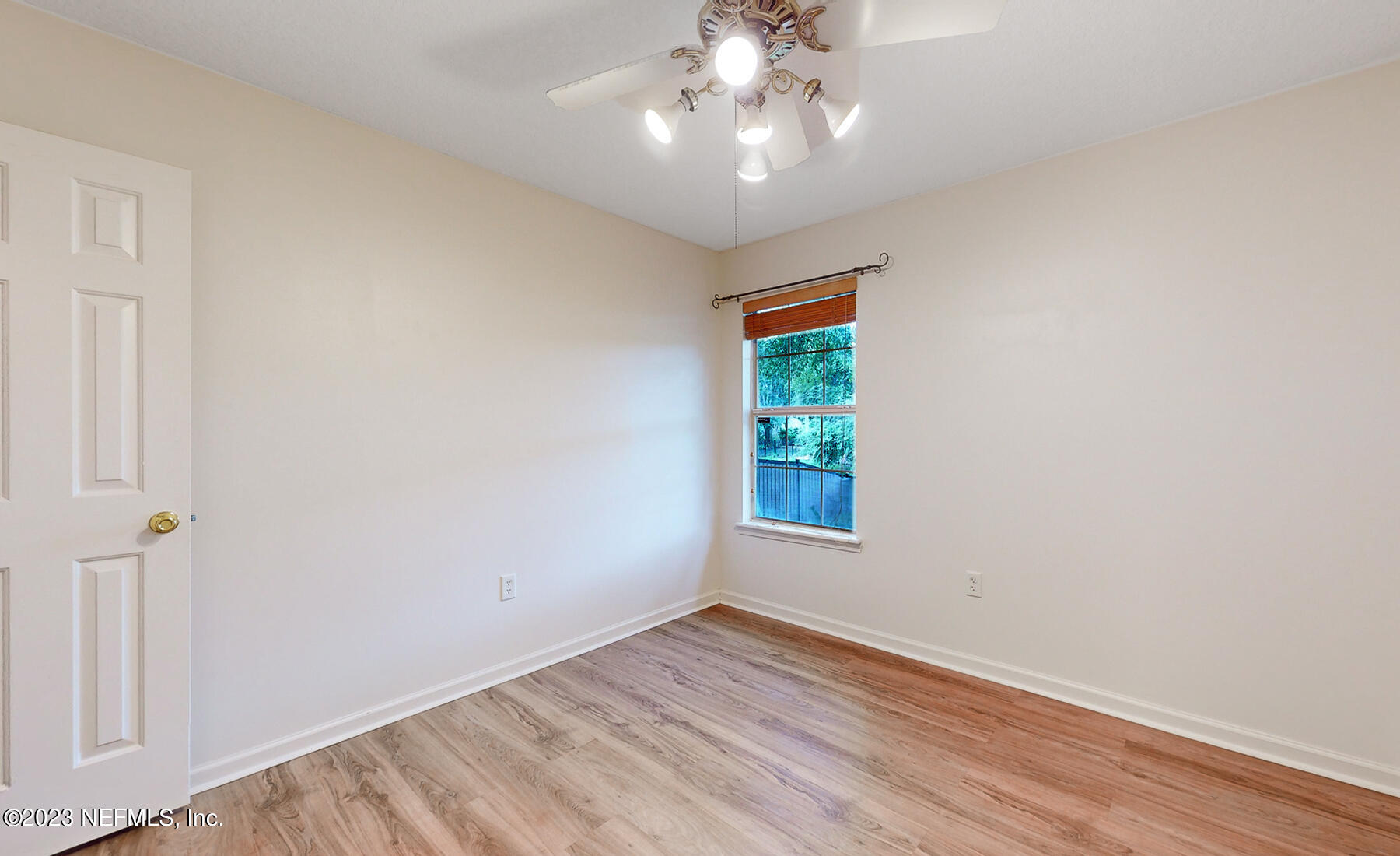 132 Summerhill Circle St. Augustine, FL 32086 - Photo 17 of 35 wooden floor in an empty room with a window