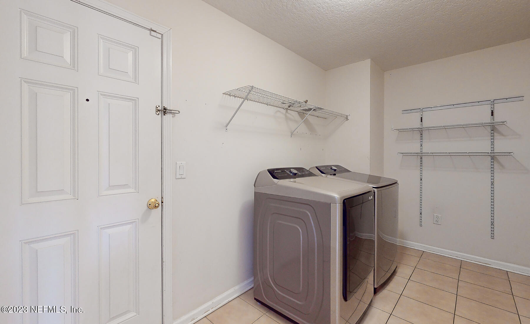 132 Summerhill Circle St. Augustine, FL 32086 - Photo 28 of 35 a utility room with dryer and washer