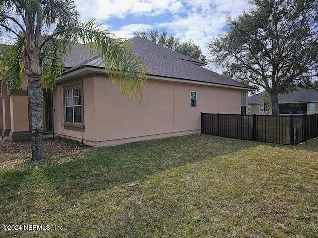 132 Summerhill Circle St. Augustine, FL 32086 - Photo 3 of 35 a backyard of a house