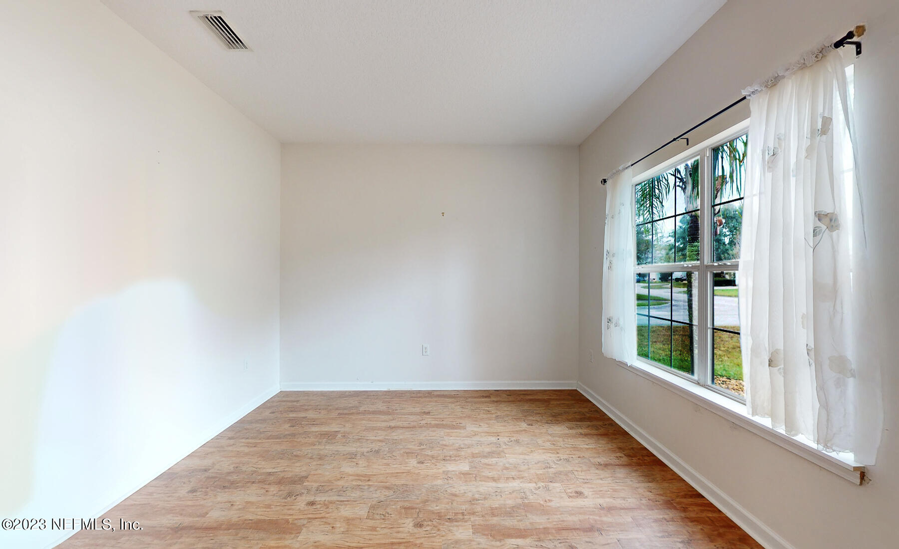 132 Summerhill Circle St. Augustine, FL 32086 - Photo 5 of 35 a view of an empty room and window