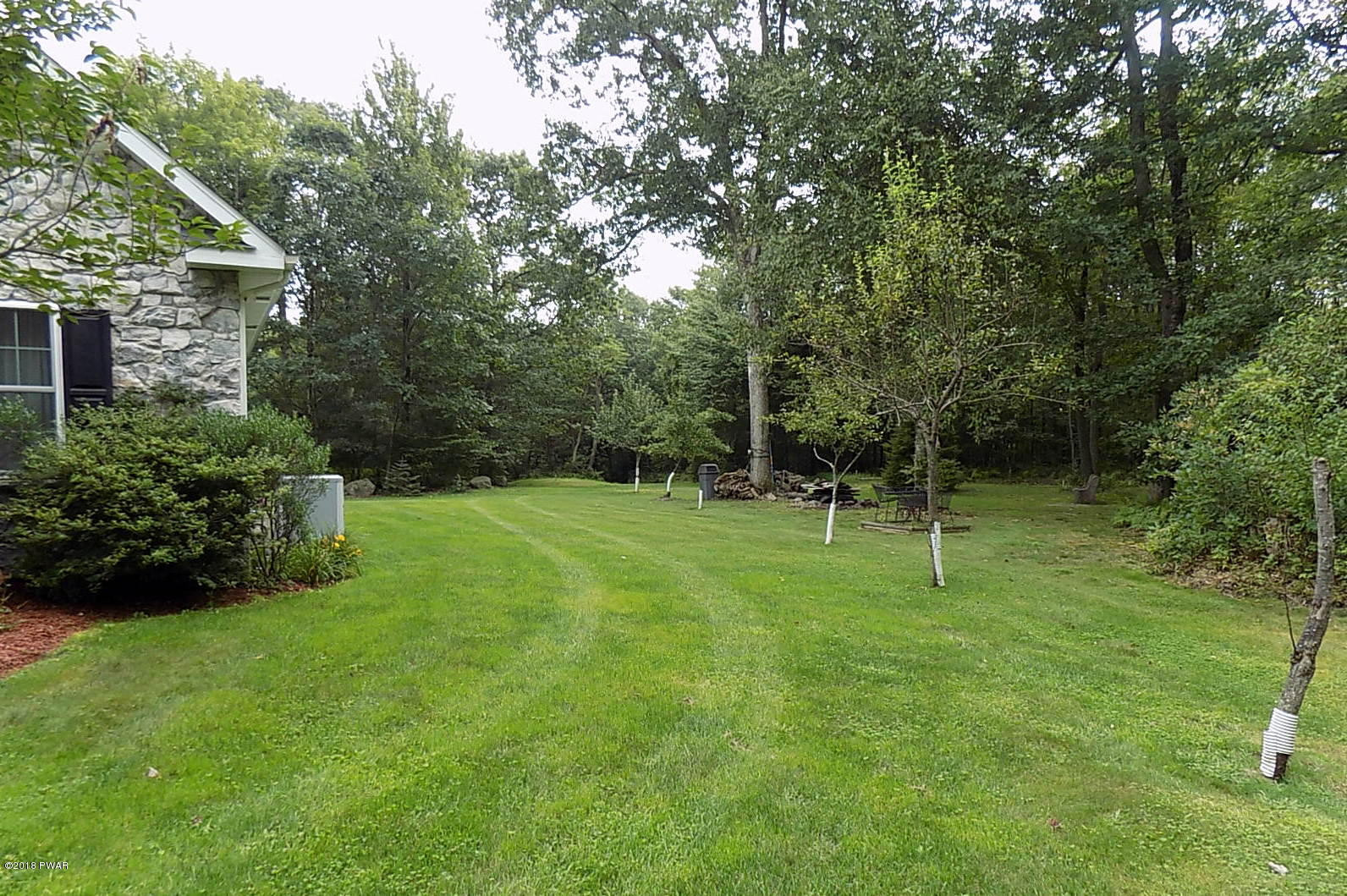 293 Mozzette Road Canadensis, PA 18325 - Photo 5 of 92 Right side of house w/Apple Trees!