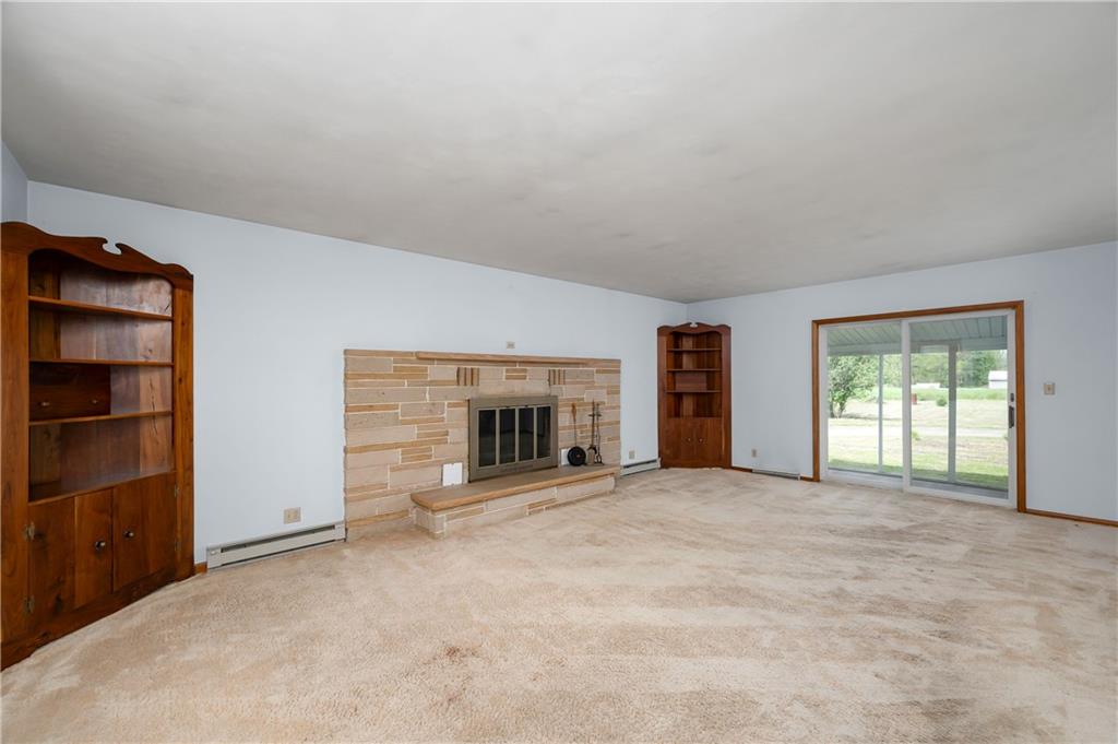 19 George Jr Road Grove City, PA 16127 - Photo 22 of 42 Living room with a cozy wood/gas starter fireplace