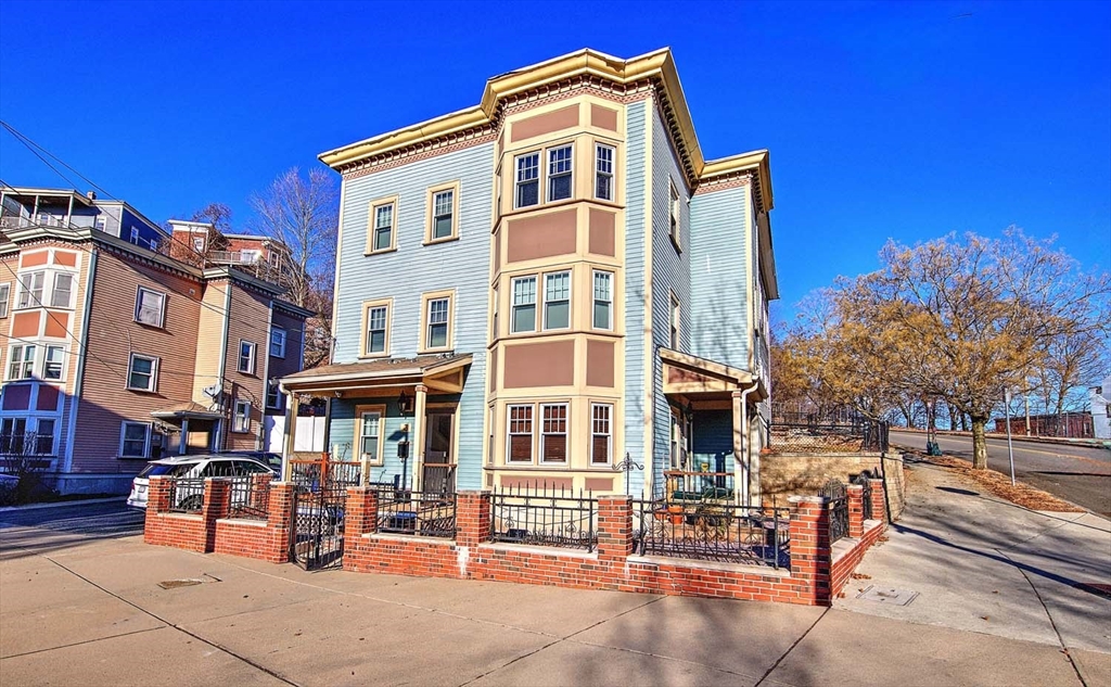 3 Wensley Street, Unit 1 Boston, MA 02120 - Photo 1 of 40 a front view of a building with street view