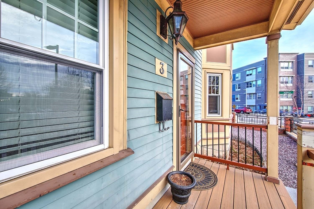 3 Wensley Street, Unit 1 Boston, MA 02120 - Photo 3 of 40 a view of a balcony with wooden floor