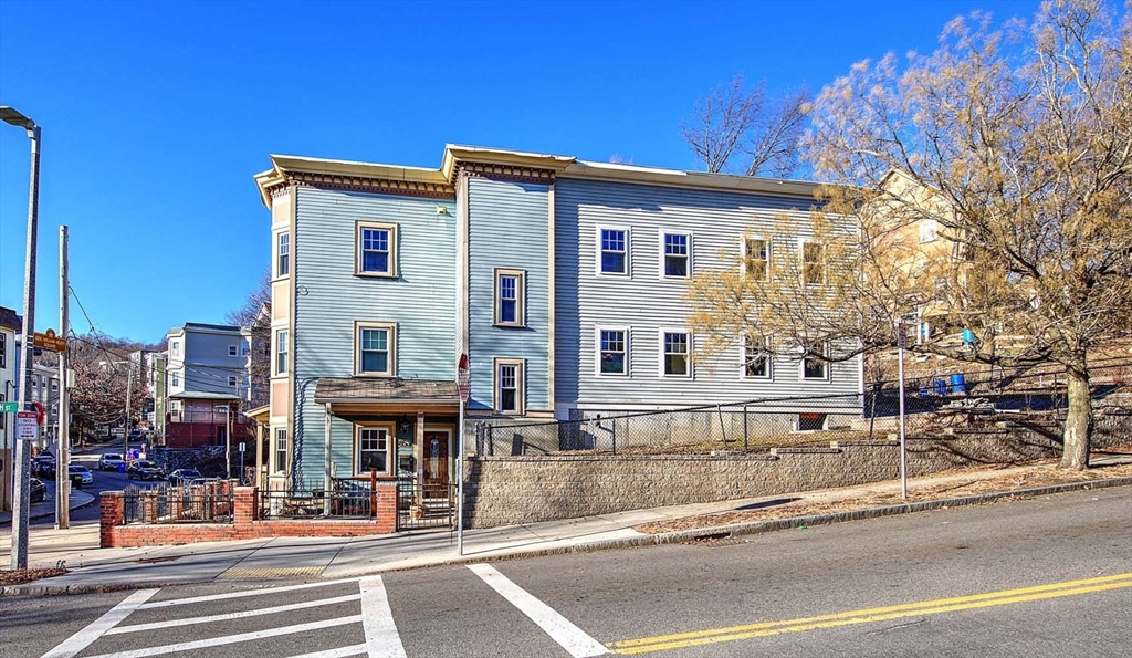 3 Wensley Street, Unit 1 Boston, MA 02120 - Photo 39 of 40 a view of a building with street