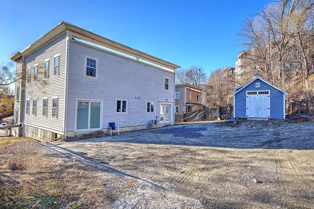 3 Wensley Street, Unit 1 Boston, MA 02120 - Photo 40 of 40 a front view of a house with a yard