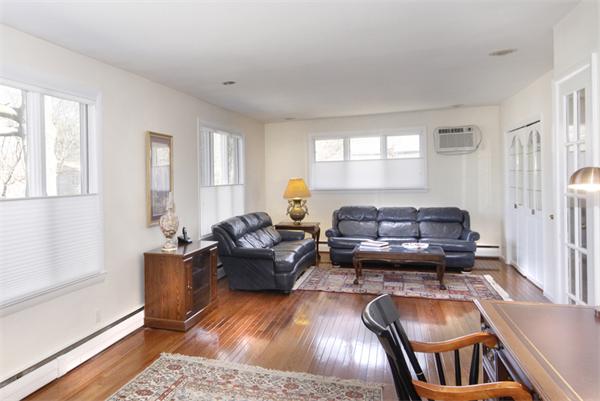 61 Winston Road Newton, MA 02459 - Photo 3 of 30 a living room with furniture or couch and a window