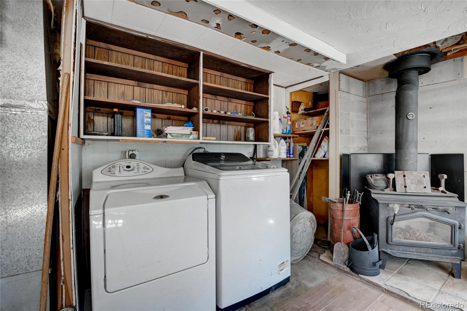 101 Main Street Bailey, CO 80421 - Photo 15 of 22 a view of walk in closet with clothes and shoes