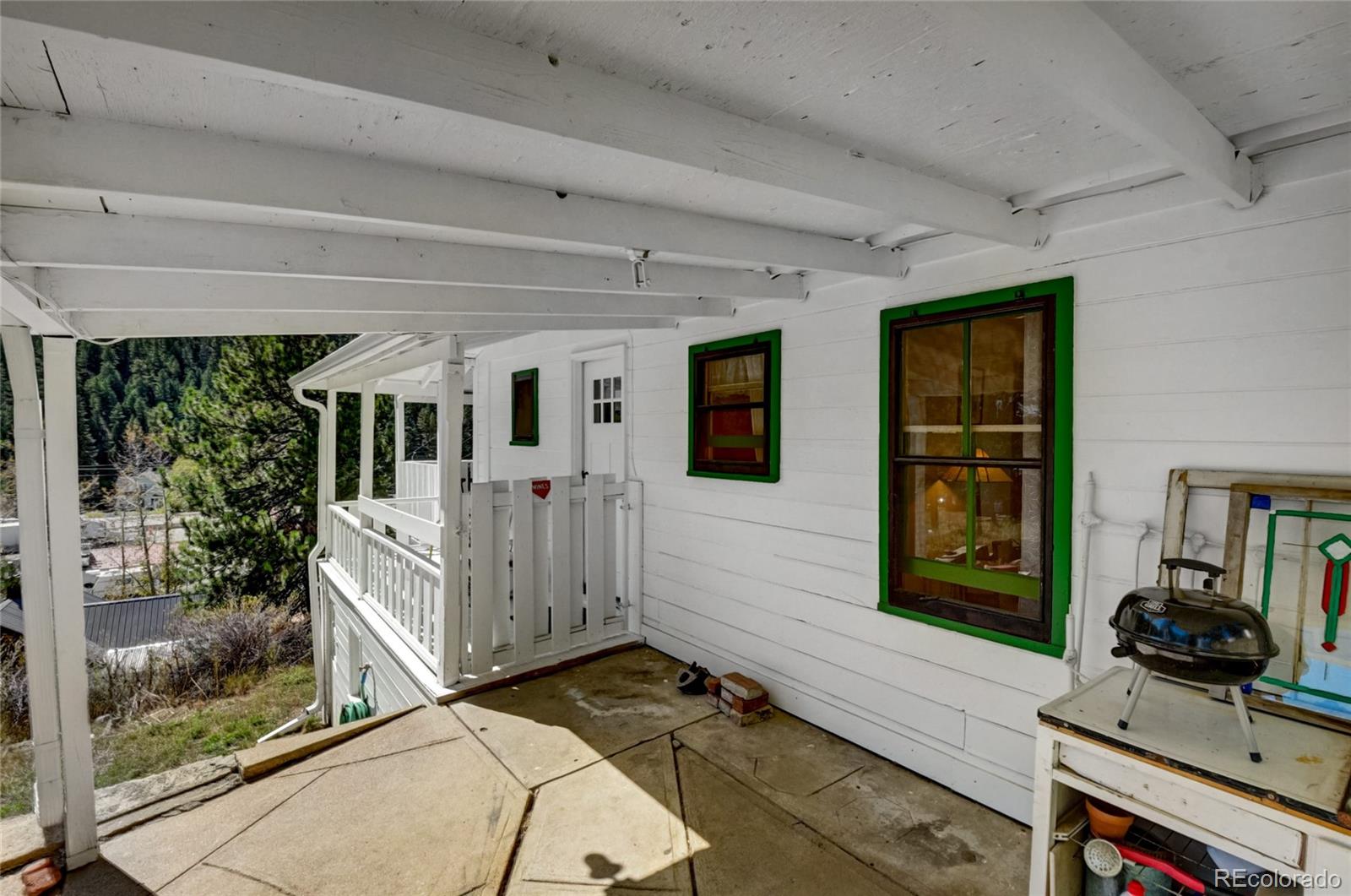 101 Main Street Bailey, CO 80421 - Photo 18 of 22 a view of a livingroom with wooden floor and furniture