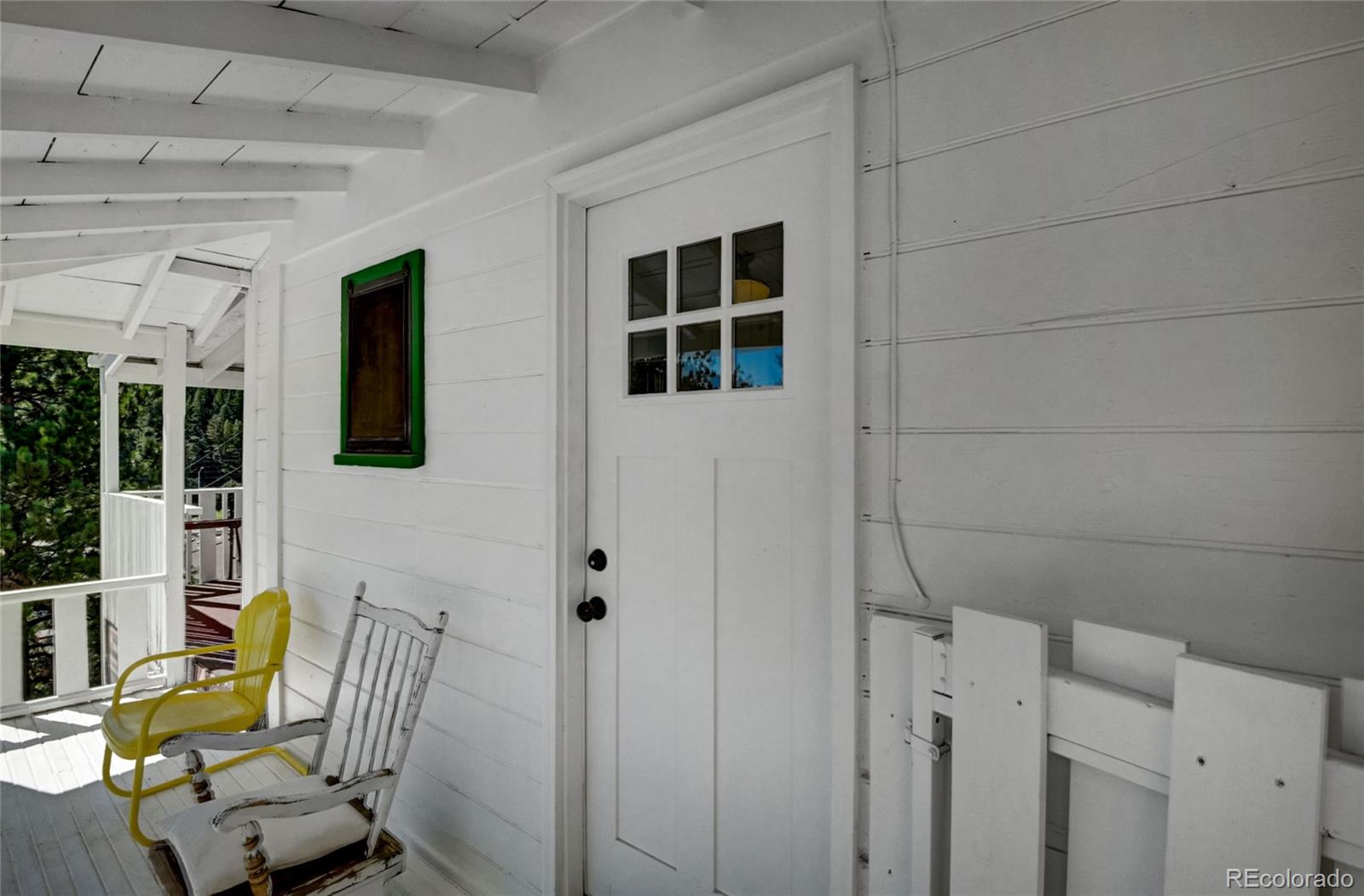 101 Main Street Bailey, CO 80421 - Photo 3 of 22 a view of a chair and fire pit in the patio