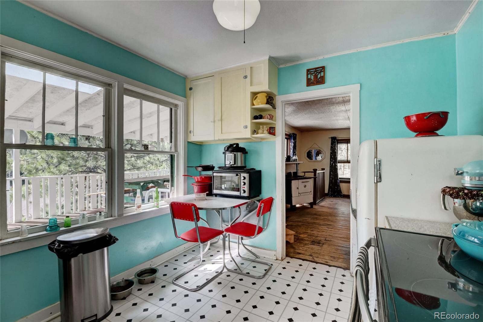 101 Main Street Bailey, CO 80421 - Photo 4 of 22 a living room with furniture rug and a window