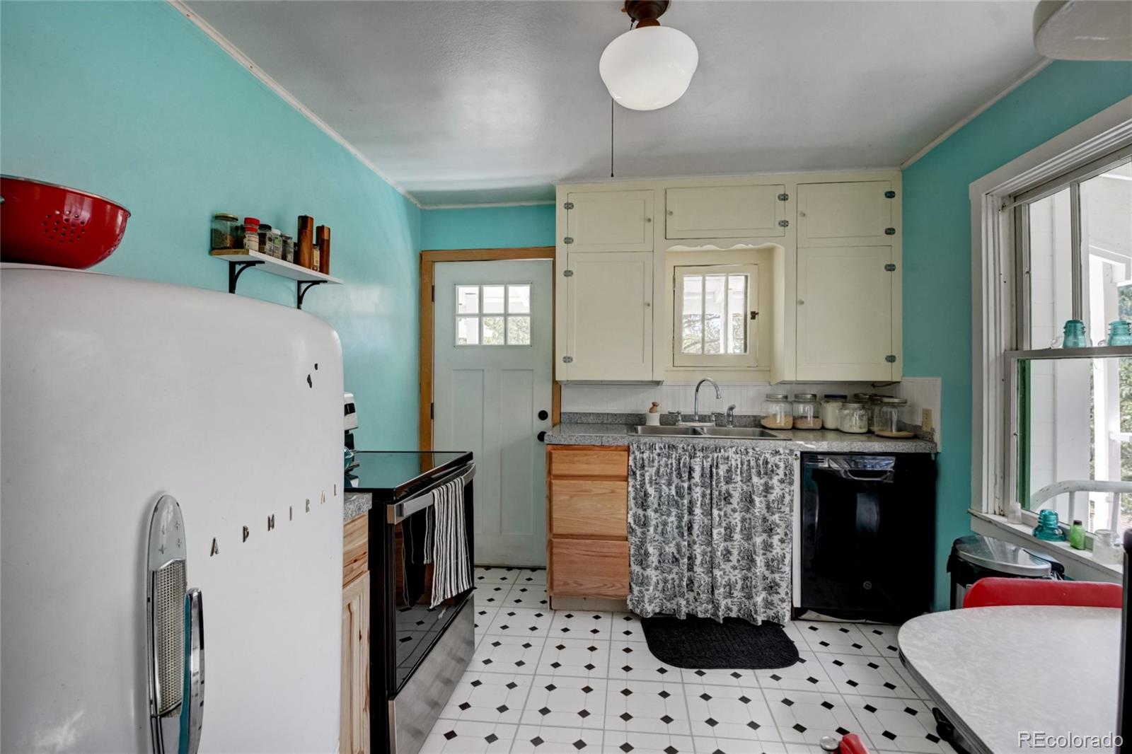 101 Main Street Bailey, CO 80421 - Photo 6 of 22 a kitchen with a sink appliances and cabinets