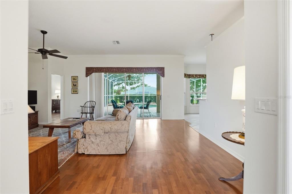 14228 Presteign Lane Spring Hill, FL 34609 - Photo 22 of 89 a living room with furniture and a large window