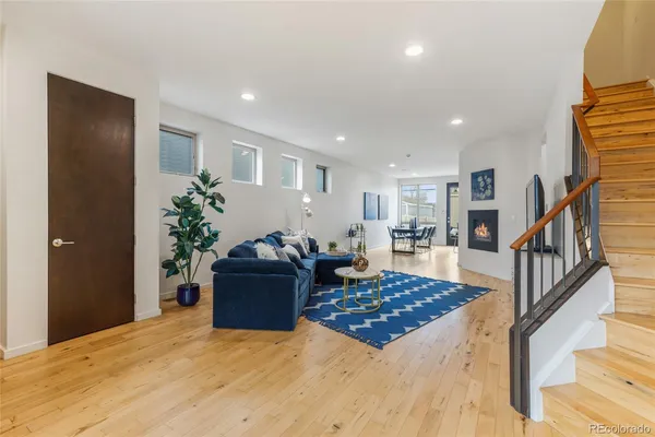 a living room with furniture and a table