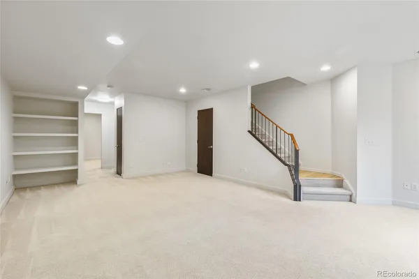 a bathroom with a shower and a toilet