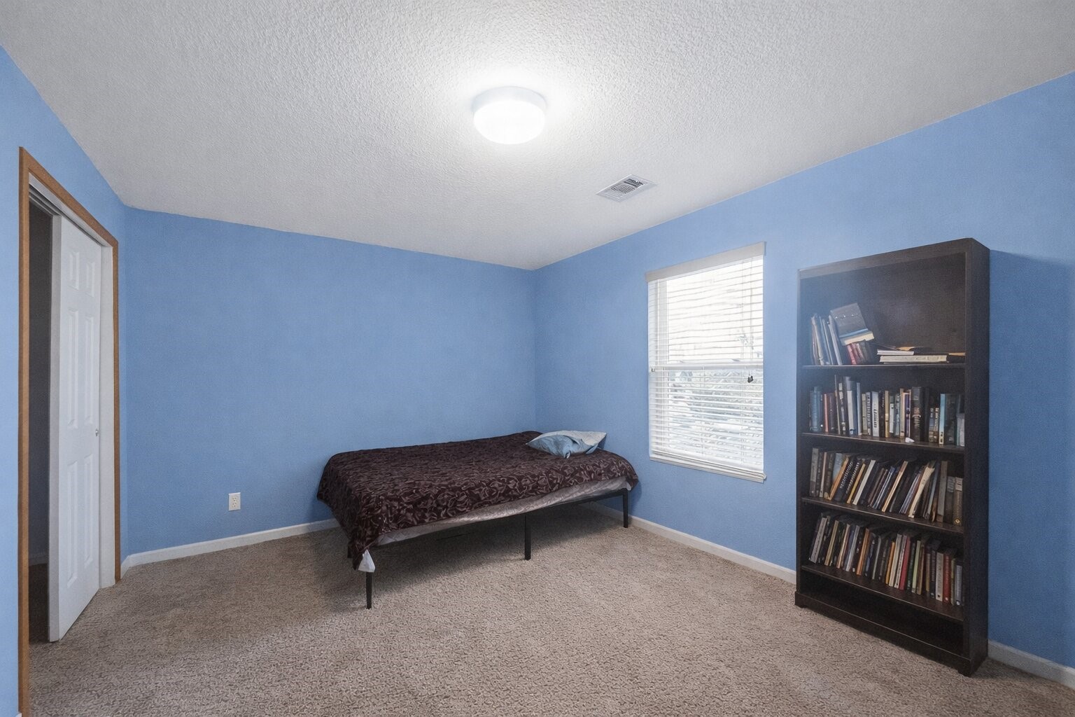 7902 Sesame Street Baytown, TX 77521 - Photo 10 of 24 a room with furniture and closet