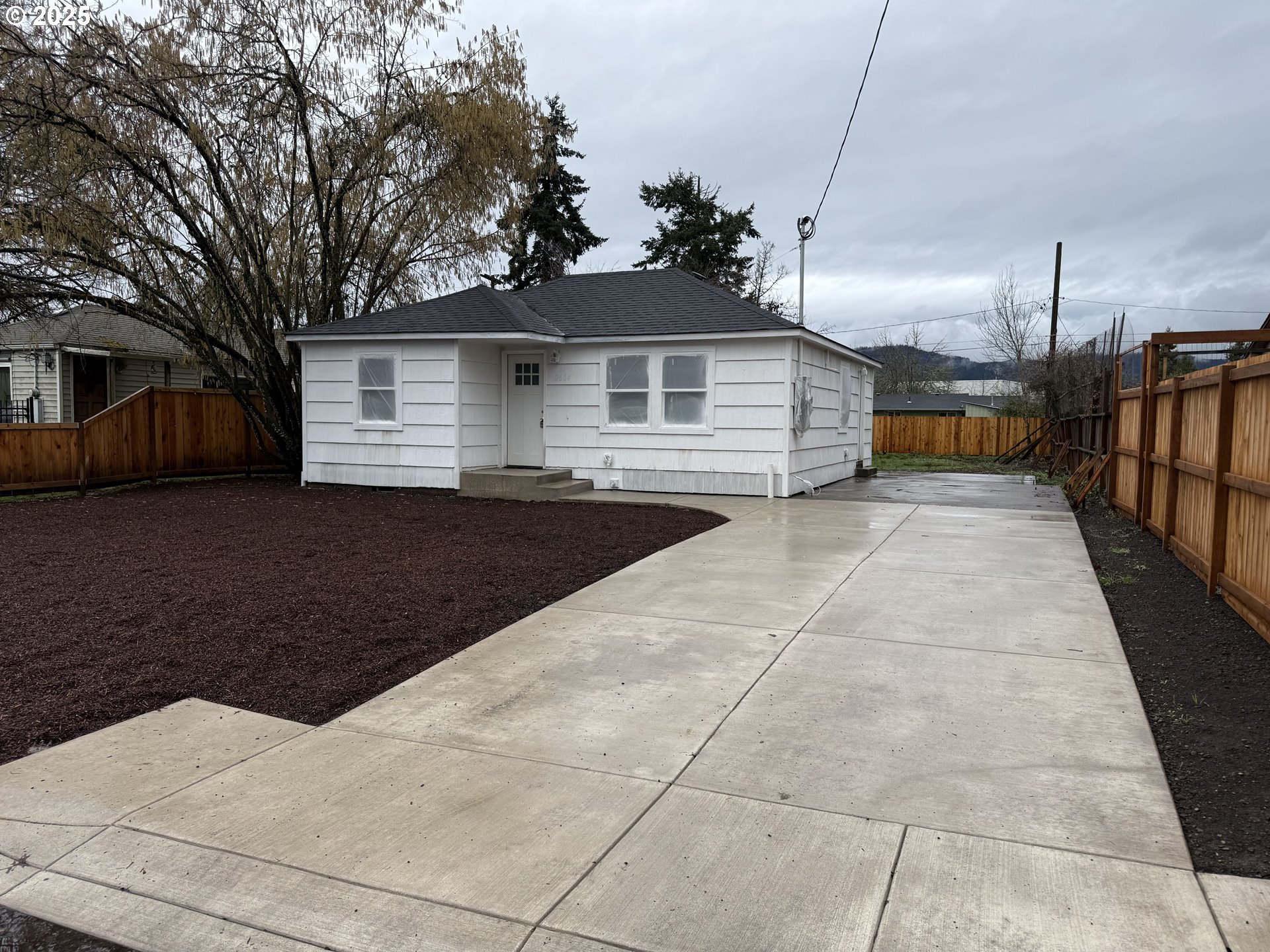 2604 J Street Springfield, OR 97477 - Photo 1 of 11 a view of a house with a backyard