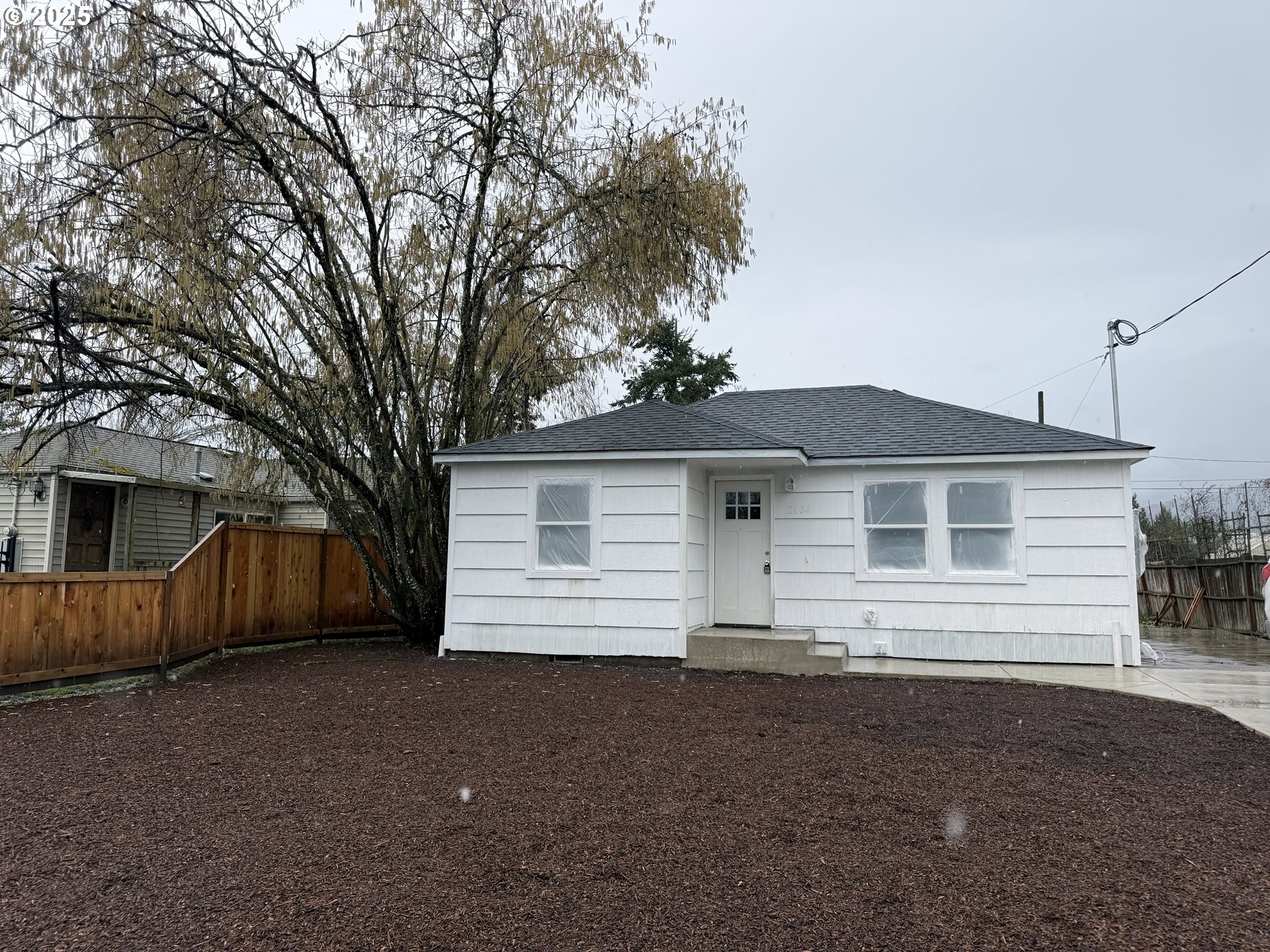 2604 J Street Springfield, OR 97477 - Photo 2 of 11 a view of a house with a yard