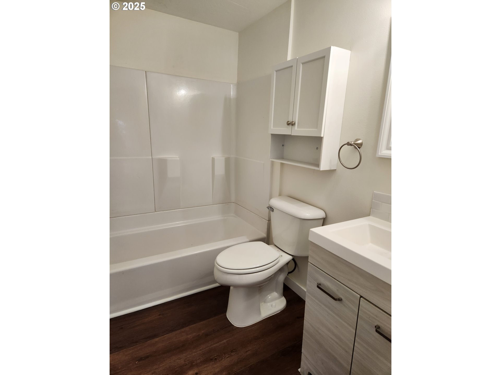 2604 J Street Springfield, OR 97477 - Photo 5 of 11 a bathroom with a white toilet and a bathtub