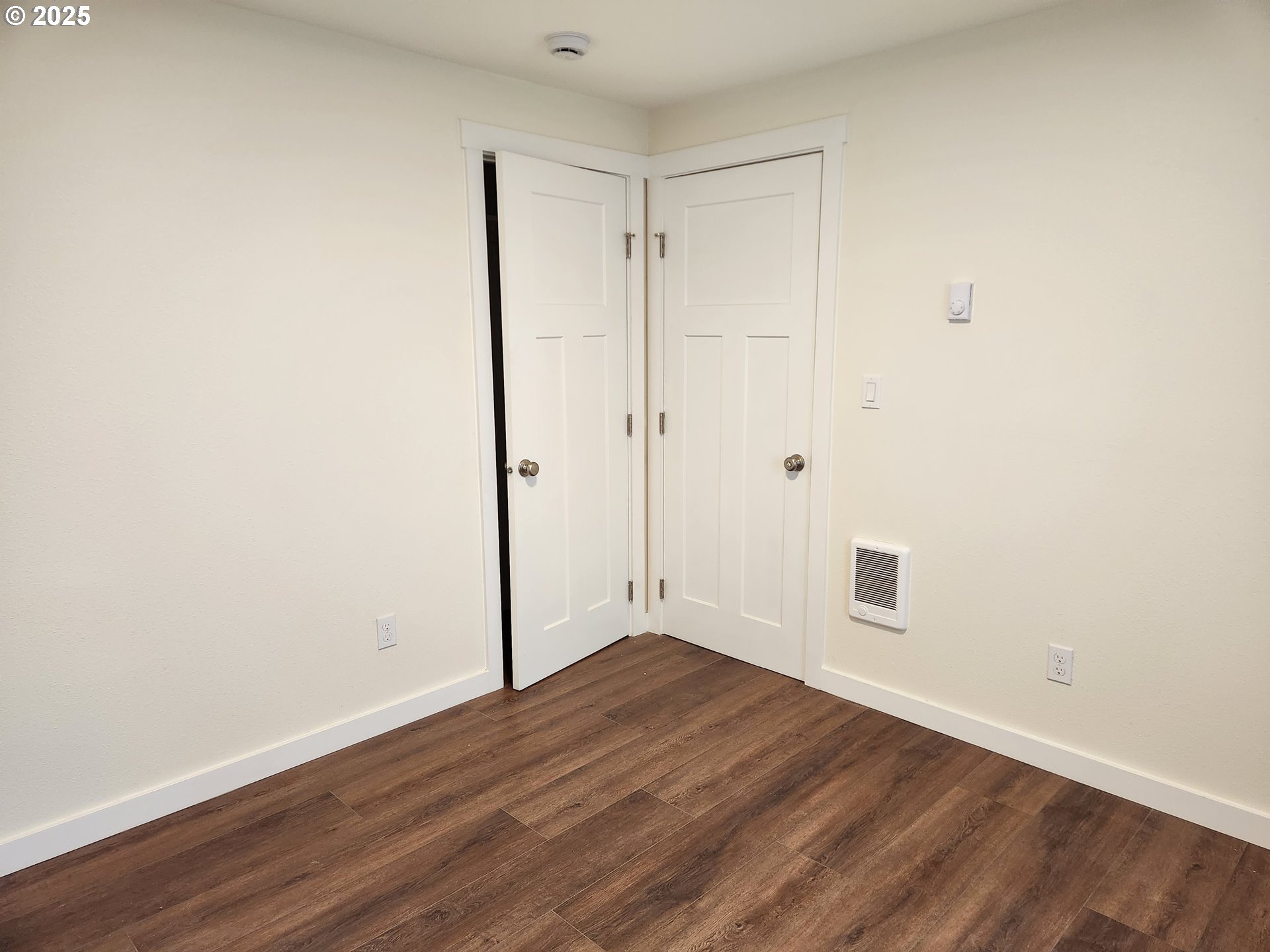 2604 J Street Springfield, OR 97477 - Photo 9 of 11 an empty room with wooden floor