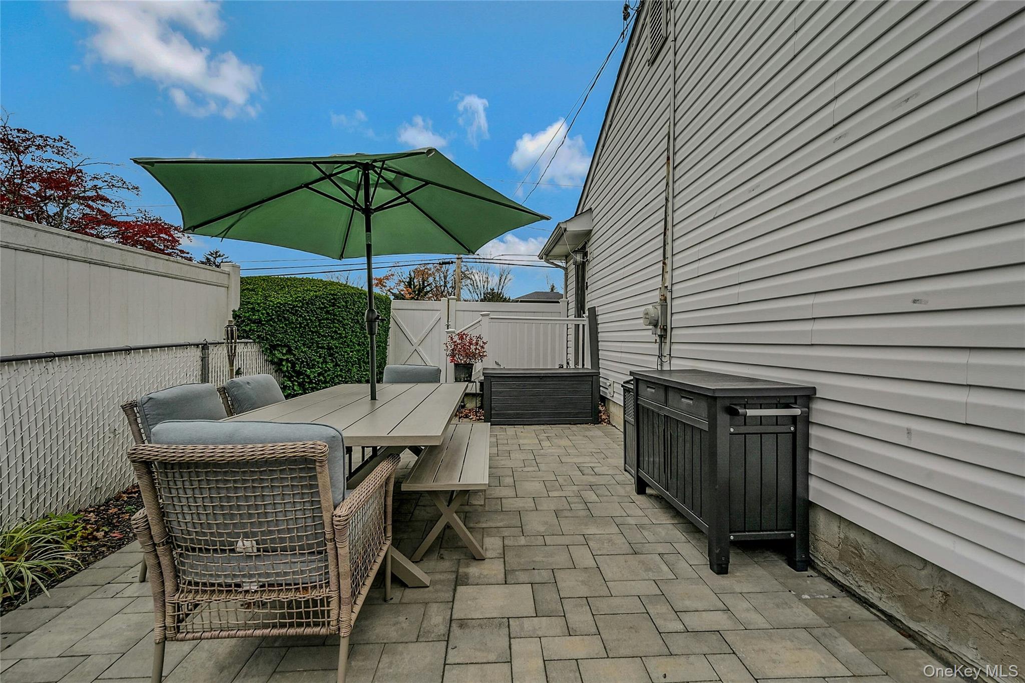 425 Blue Point Road Farmingville, NY 11738 - Photo 21 of 32 a view of outdoor kitchen with seating space