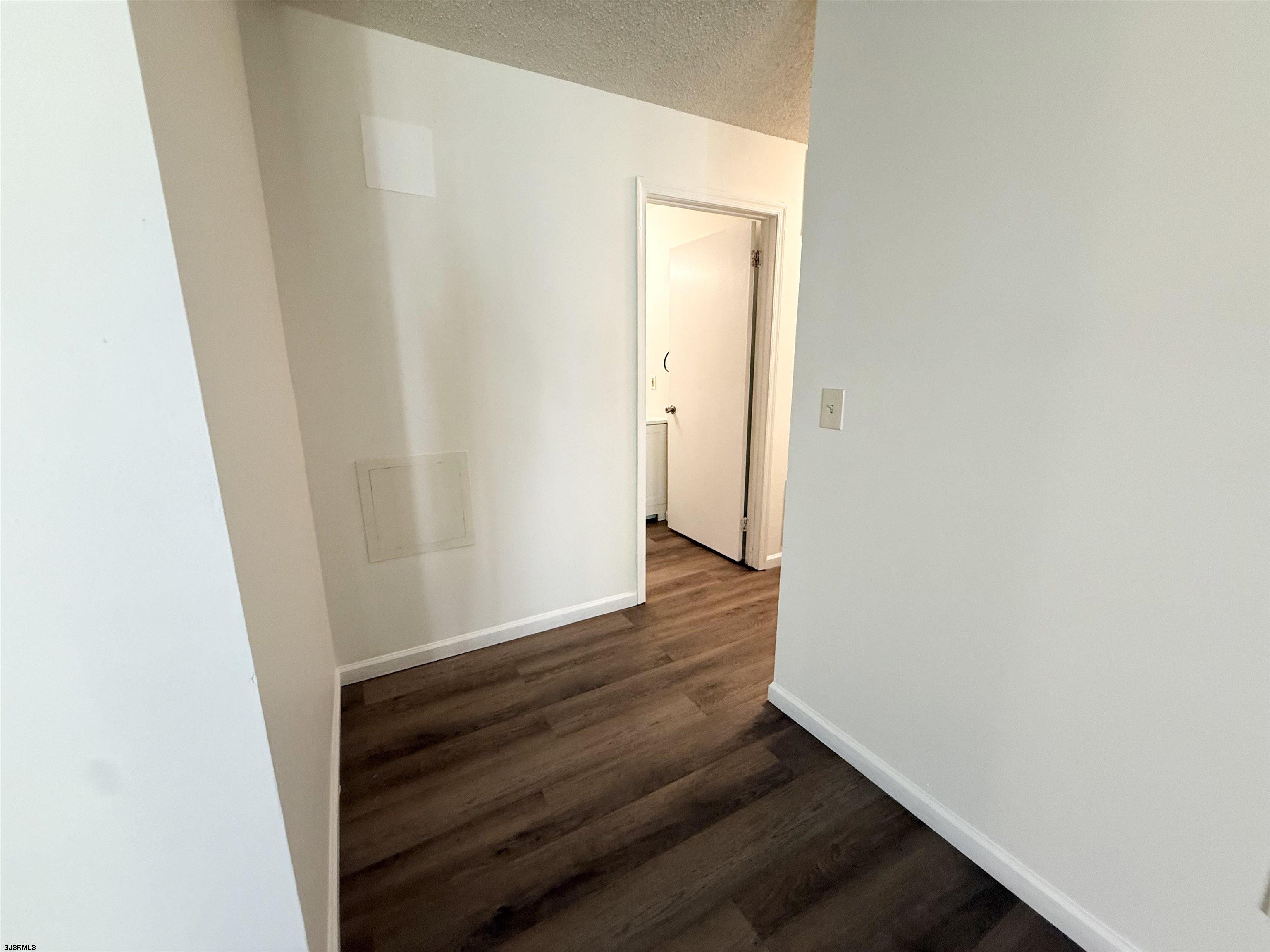 11 Colonial Court, Unit 11 Galloway Township, NJ 08205 - Photo 5 of 15 a view of wooden floor