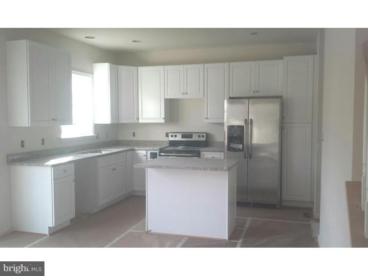 411 Birdie Road Locust Grove, VA 22508 - Photo 2 of 30 a kitchen with stainless steel appliances a sink stove and refrigerator