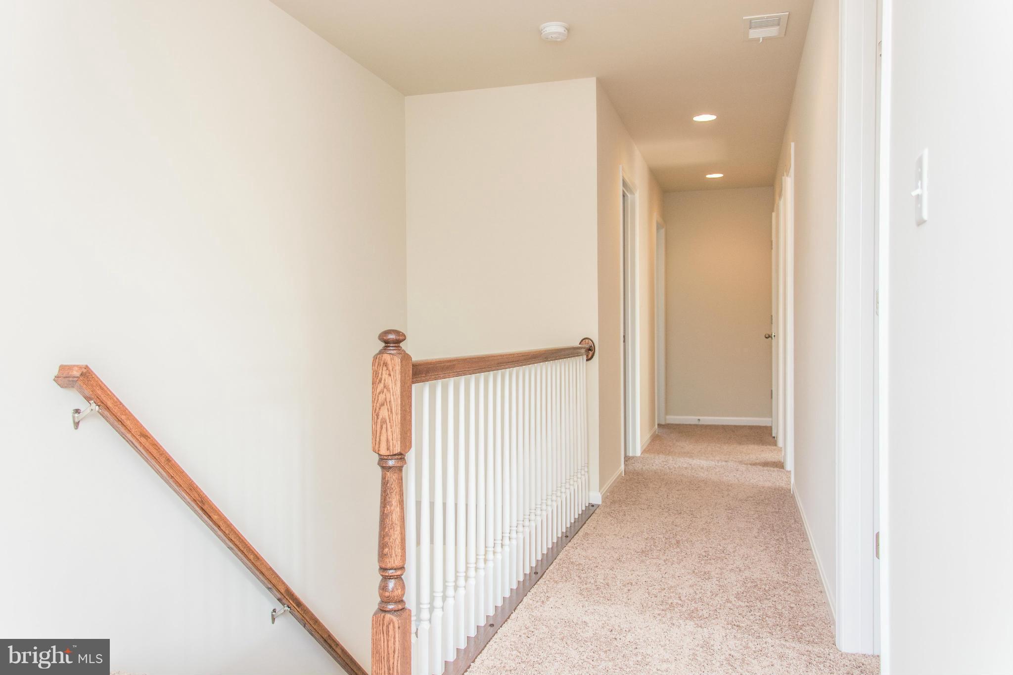 411 Birdie Road Locust Grove, VA 22508 - Photo 12 of 30 a view of a hallway with a white walls