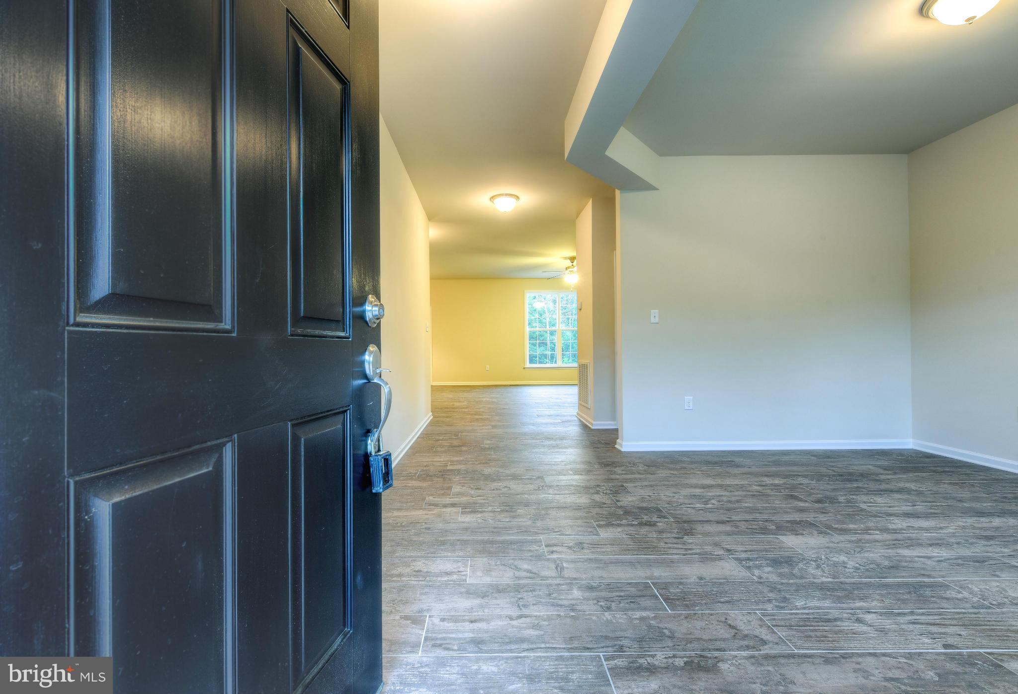411 Birdie Road Locust Grove, VA 22508 - Photo 5 of 30 a view of hallway with livingroom