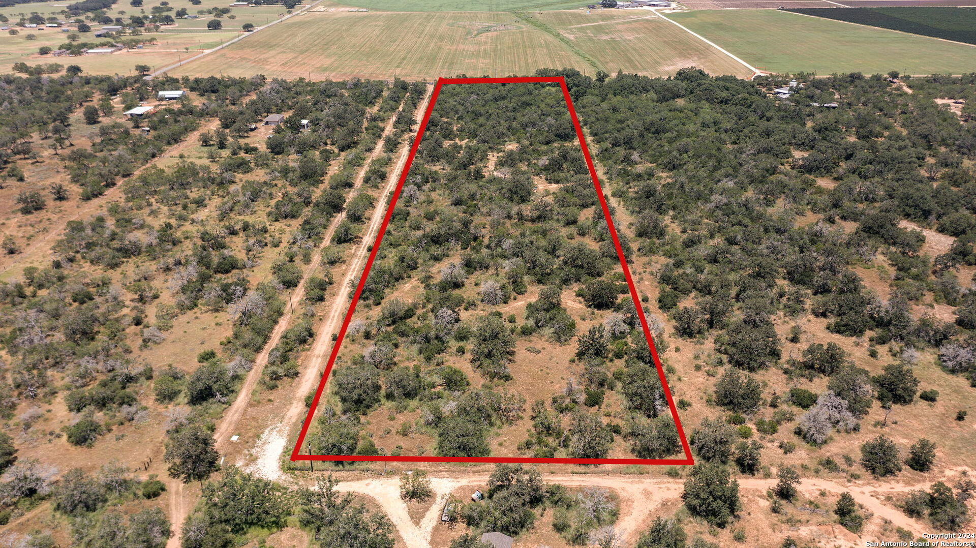 Lot 3 Bruce Road Poteet, TX 78065 - Photo 2 of 4 a view of a yard