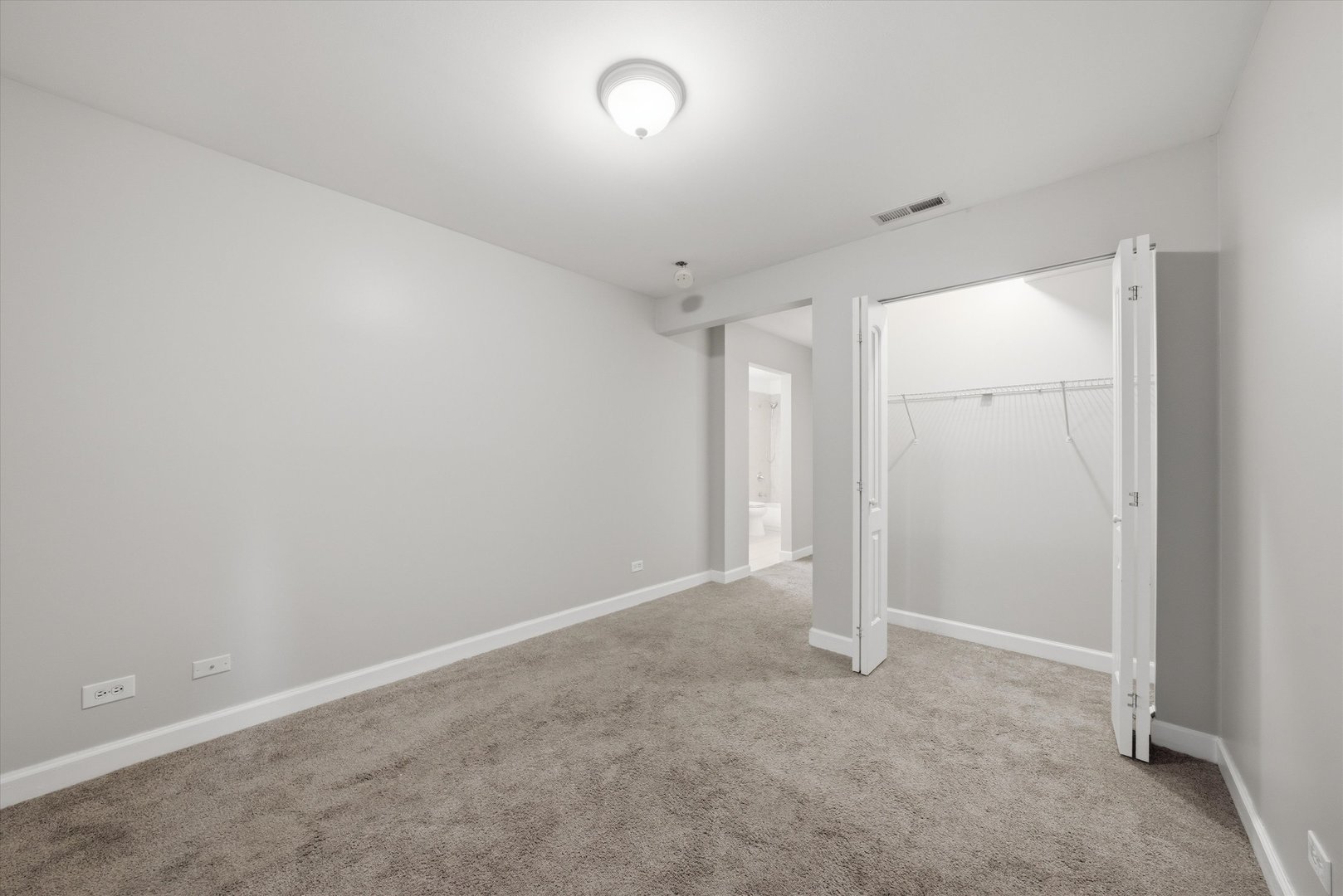 3447 Ridgeland Avenue, Unit 104 Berwyn, IL 60402 - Photo 11 of 12 an empty room with a empty space and windows