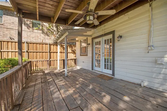 a view of a porch with wooden floor